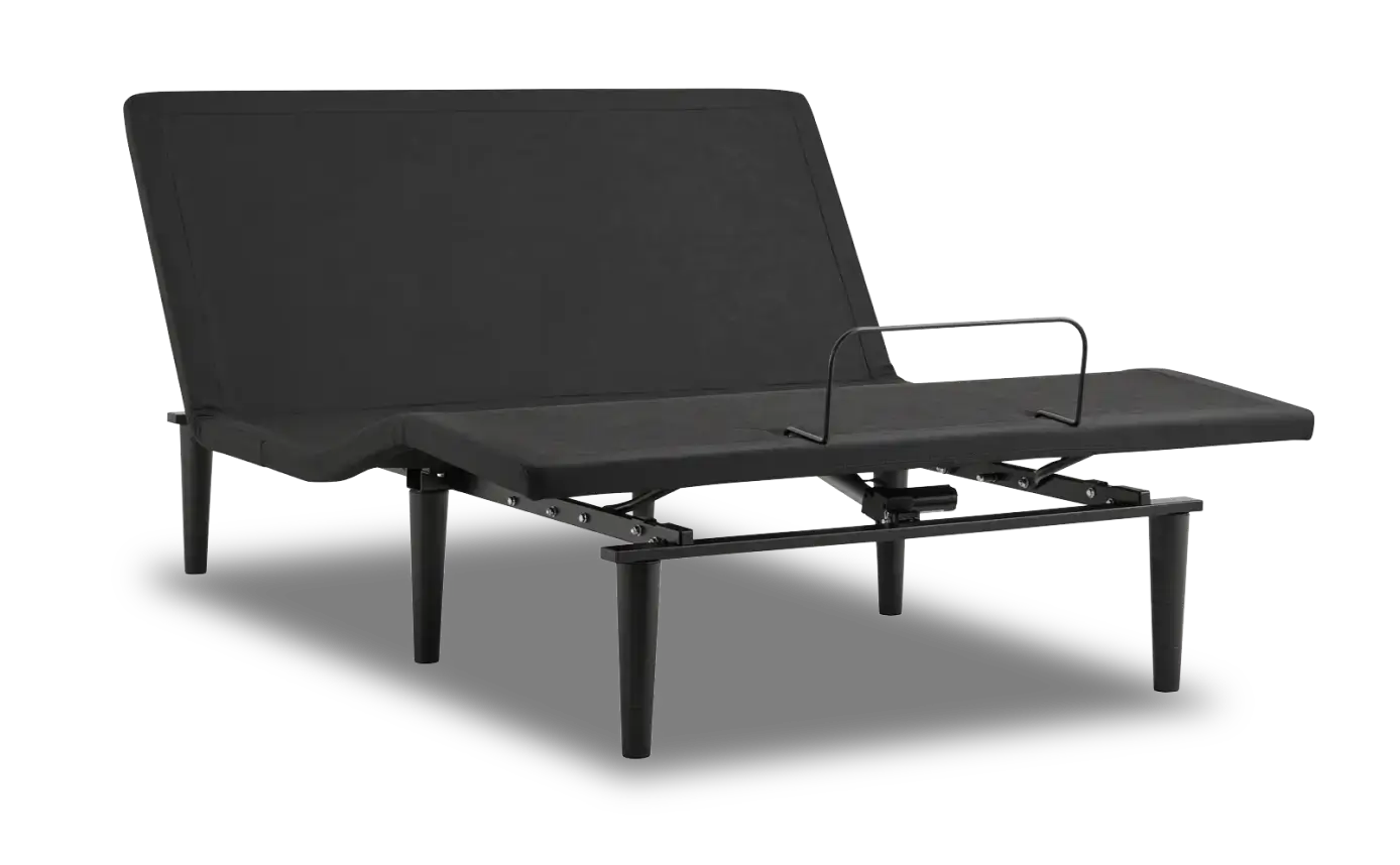 A black adjustable bed base with the head elevated.