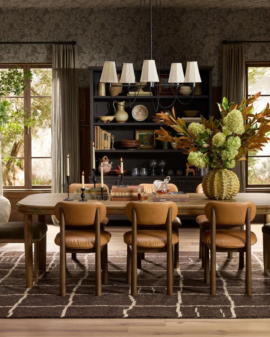 Dining room with wood table and leather chairs